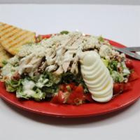 Cobb Salad with Chicken · Romaine lettuce, ranch dressing, bacon crumbles, blue cheese crumbles, tomato, green onion, ...