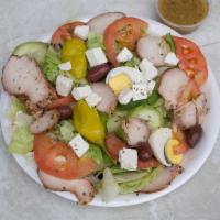 Greek Salad · Garden salad with egg, feta cheese and oregano.