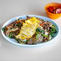 Jopche · Potato noodles with vegetables, egg, and beef sauteed in soy sauce.
