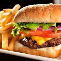 The All American Burger · Served with lettuce, tomato and onions with your choice of cheese.