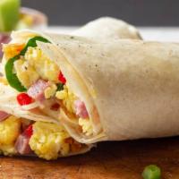 Breakfast Wrap · 2 scrambled eggs with choice of meat, green peppers, onions, hash browns and choice of cheese.