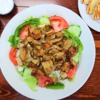 Chicken Shawarma Salad · Chicken shawarma on a bed of fresh mixed greens, green peppers, red onions, tomatoes, cucumb...