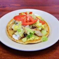 Chicken Breast Pita · Marinated charbroiled chicken breast served on a pita with lettuce, tomatoes and tzatziki sa...
