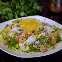  Cilantro Salad (Ensalada Cilantro) · Romaine lettuce, Marinated Grilled Chicken or *Asada (steak)  with corn kennels onions, cila...