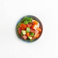 Poke · Tuna, salmon, crab salad, seaweed salad, cucumber, masago (+unagi $2) with choice of sauce y...
