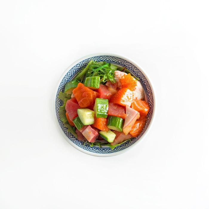 Poke · Tuna, salmon, crab salad, seaweed salad, cucumber, masago (+unagi $2) with choice of sauce yuzu soy or sweet spicy