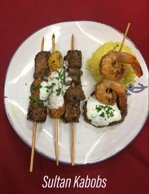 Sultan Kabob Feast · A platter of kabobs: chicken, lamb, beef steak shrimp and a kefta patty spiced ground beef each uniquely marinated to enrich their own delicate flavors and grilled to perfection! Served with saffron rice.