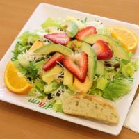 3. California Salad · Crisp romaine lettuce hearts, fresh cut seasonal fruit, rice noodles, sweet
raisins, roaste...