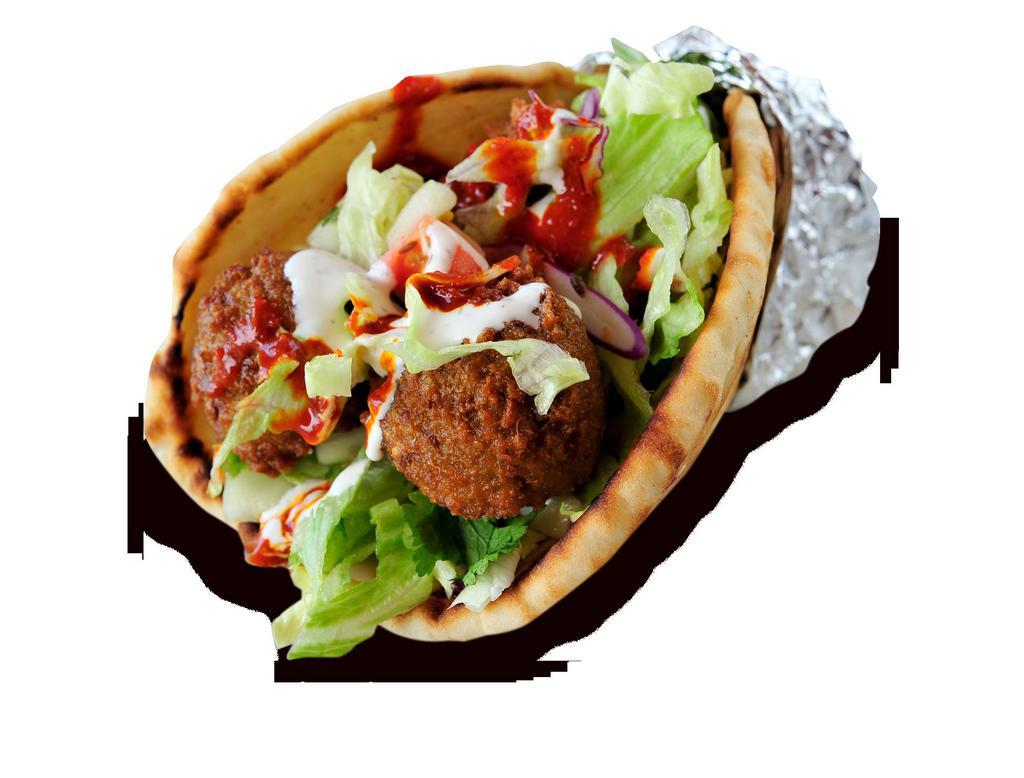 Falafel on Pita · Freshly cooked all vegetarian, deep fried to perfection, consisting of ground chick peas and our combination of herbs and spices served on a fresh eight-inch pita and toppings of your choice.