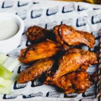 Smoked Wings · Smoked and deep fried, tossed in either:
(1) Joe’s KC competition BBQ glaze
(2) Buffalo hot ...