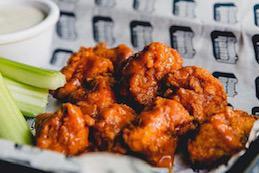 Boneless Wings · Seasoned our dusted chicken breast nuggets
tossed in either:
(1) Joe’s KC competition BBQ glaze
(2) Buffalo hot sauce
Served with celery, with ranch or bleu cheese dressing.