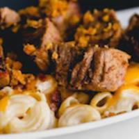 Loaded Mac and Cheese · Pasta, queso, shredded cheddar, diced bacon,
burnt ends.