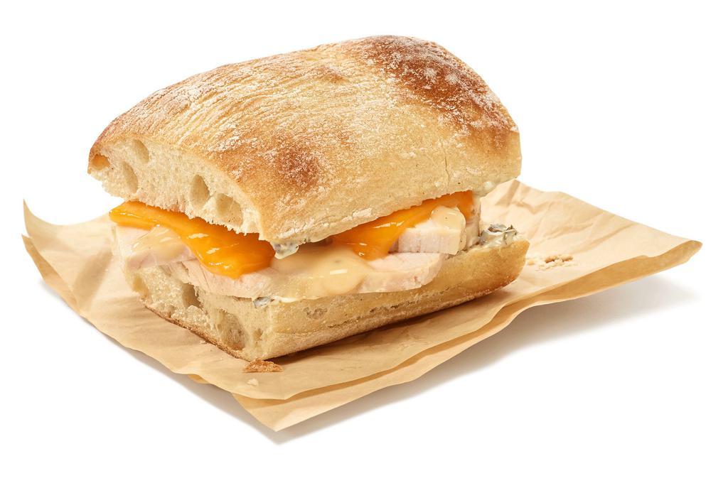 Turkey Cheddar Slider · Garlic sauce & herbed mayo with cheddar cheese.