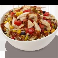 Southwest Chicken Rice Bowl · Corn bean relish, chipotle pesto sauce, cilantro lime rice, pico de gallo.