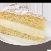 Lemon Italian Crème Cake Slice · Cream cake filled with refreshing lemon cream and topped with vanilla cake crumbs.
