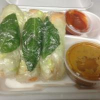 2. Fresh Salad Rolls · Fresh rolls filled with basil, carrot, lettuce and rice noodle. Served with peanut sauce.