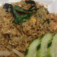33. Basil Fried Rice · Spicy fried rice with egg, fresh basil, chili, garlic, bell pepper, onion, cilantro and choi...