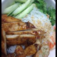 74. Vietnamese Bun Thit Noung · Vermicelli with choice of grilled chicken or pork, lettuce, cucumber, carrot and bean sprout...