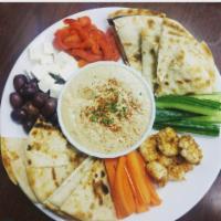Hummus · Feta cheese, kalamata olives, roasted red peppers, cucumbers, carrots & grilled pita.