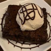 Brownie A La Mode · Vanilla ice cream, chocolate sauce
