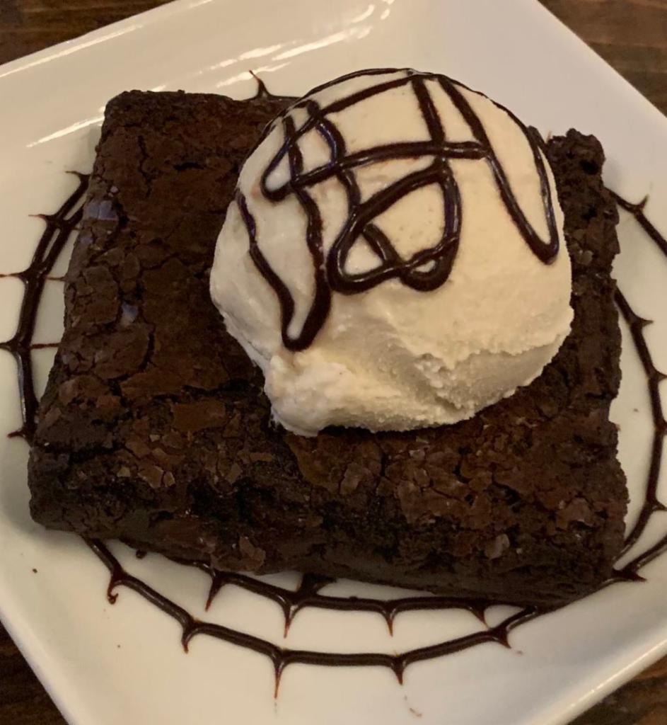 Brownie A La Mode · Vanilla ice cream, chocolate sauce