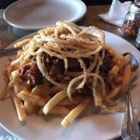 Pulled Pork Fries  · French fries drizzled with our homemade cheese sauce, topped with pulled pork and fried onio...