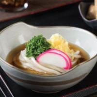 Kake Udon · Traditional Japanese udon soup. Broth made from different fish and kelp dried and prepped in...