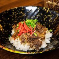 Beef Bowl Gyudon Rice Bowl · Sweet marinated slow cooked beef and onions topped on steamed white rice. A traditional home...