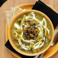 Ash Reshteh Soup · Vegetables, beans, and Persian noodles with kashk. Yogurt based topping.

