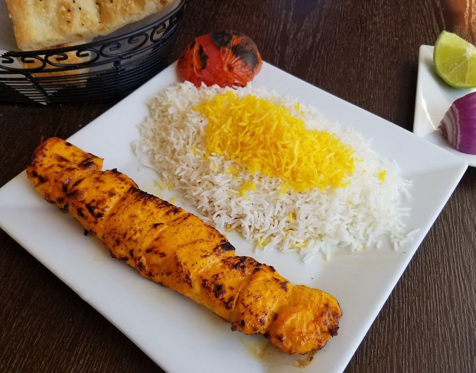 Chicken Breast Kabob · Served with a choice of salad or basmati rice with saffron. Marinated and grilled cubes of chicken breast.
