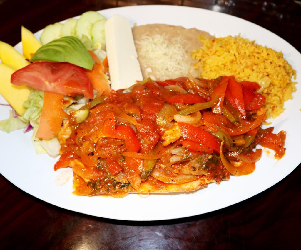 Filete a la Talla · Tender grilled tilapia filet topped with sauteed secret sauce onions, red peppers, green peppers, served with rice, refried beans, salad, fresh avocado slices, and sour cream.