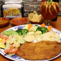 Filete Empanizado · Fish fillet dredged in breadcrumbs fried to crispiness, steam veggies, white rice, salad, an...