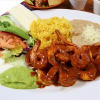 Camarones a la Diabla · Fresh shrimp sauteed with homemade hot sauce, served with salad, rice, refried beans, cheese...