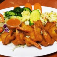 Camarones Empanizados · Shrimps dredged in breadcrumbs tried to crispiness, steam veggies, white rice, salad, and av...