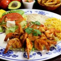 Camarones a la Plancha · Fresh shrimp grilled to tenderness, sauteed with our special mild spicy sauce, served with s...