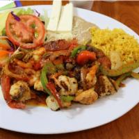 Fajitas De Camaron · Fresh savory shrimp lightly spiced and cooked with red and green bell pepper, onion and toma...