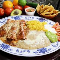 Enchiladas Rojas · 3 rolled corn tortilla filled with your choice of meat, topped with our tasty homemade mole ...