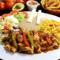 Fajitas de Pollo · Tender thin chicken breast strips slightly spiced and cooked with red and green bell pepper,...
