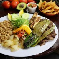 Tampiquena · Carefully grilled skirt steak, Mexican prickly cactus, fresh Mexican cheese, onions, and jal...