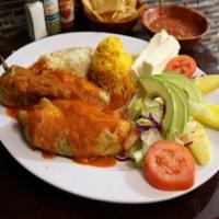Chile Relleno  · 1 fresh poblano green peppers stuffed with fresh cheese, topped with homemade tomato sauce, ...