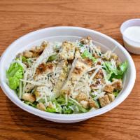 Caesar Salad · Shredded Parmesan, house croutons, with romaine lettuce, Caesar dressing.
