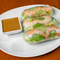 A2.  Fresh Spring Rolls · 3 pieces. Rice paper wrapped with shrimps, chicken, vermicelli noodle, lettuce, carrots and
...