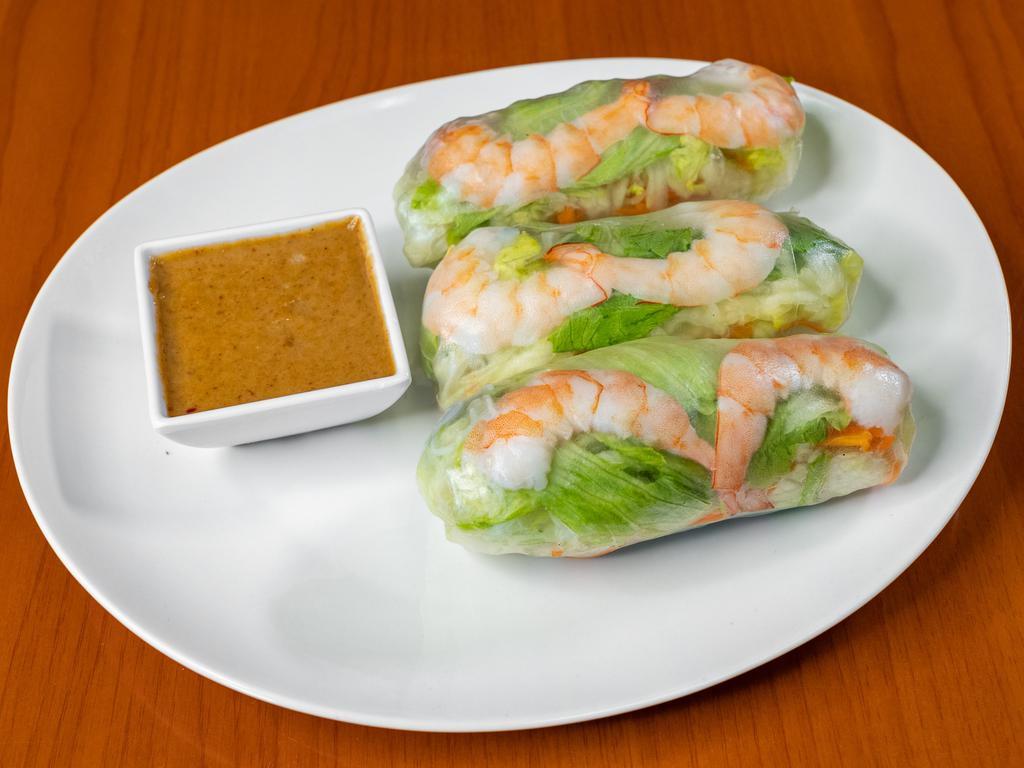 A2.  Fresh Spring Rolls · 3 pieces. Rice paper wrapped with shrimps, chicken, vermicelli noodle, lettuce, carrots and
basil leaves with creamy peanut sauce.