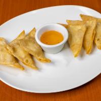 A10. Crab Rangoon · 5 pieces. Wonton shell stuffed with cream cheese and crab meat.