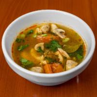 S1. Tom Yum Soup · Thai hot and sour soup. Thai famous food you must try! Choice of chicken, tofu, shrimp or se...