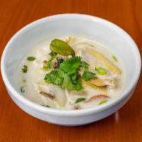 S2. Tom Kha Soup · Thai coconut soup. Coconut milk soup with your choice of chicken, tofu, shrimp or seafood wi...