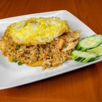 FR5. Tasty Thai Fried Rice · Baby corns, peas, onions, tomatoes, carrots and house sweet chili paste topped with fried egg.