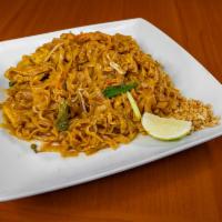 N1.  Pad Thai · Rice noodle, eggs, bean sprouts, green onions, stir-fried in house pad thai sauce topped wit...