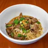 N6. Thai Beef Noodle Soup · Pho. Flavorful beef broth with sliced beef, beef stew, beef meatball and rice noodle topped ...