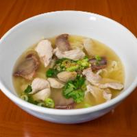 N7. Thai Pork Noodle Soup · Flavorful pork broth with BBQ pork, pork patties and pork meatballs and rice noodle topped w...